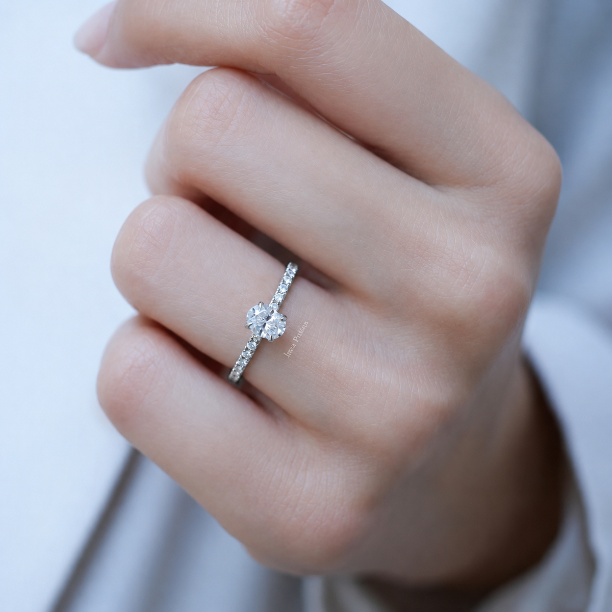 0.70 Carat Oval Diamond Solitaire Ring with Side Stones